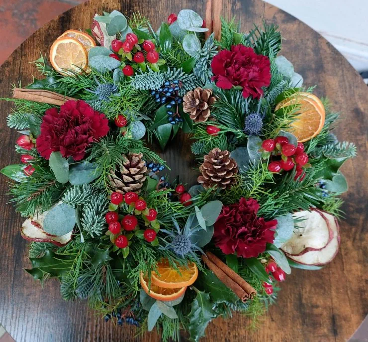 Christmas flowers and seasonal greenery